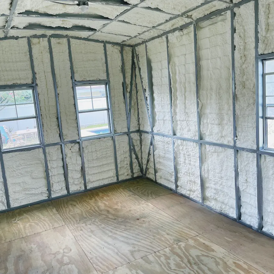 Closed-cell spray foam insulation applied to wall cavities in a residential project in Cloverdale